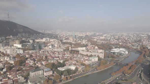 Tbilisi, Georgia - October 25 2021: Flying over Baratashvili bridge in the center of Tbilisi