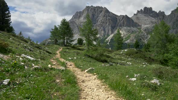 Gimbal Shot of a Trekking Trip Through Dolomites, a Mountain Range in Italian Alps