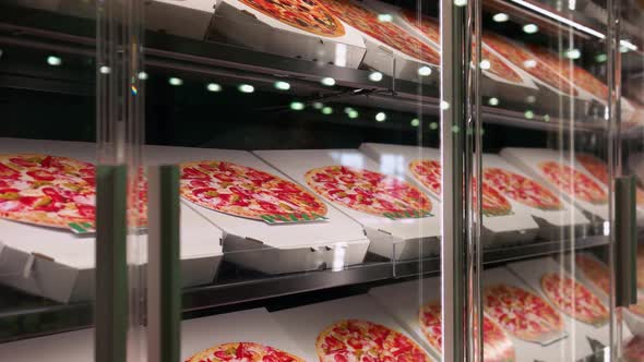 Stack of Many Red and White Pizza Boxes