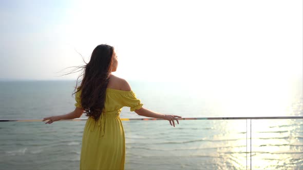 Asian woman enjoy around beautiful beach sea ocean