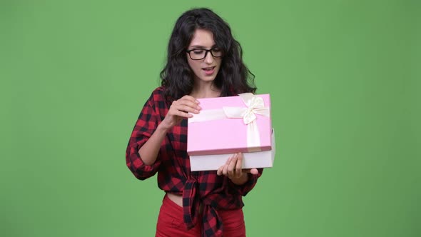 Young Beautiful Businesswoman with Gift Box