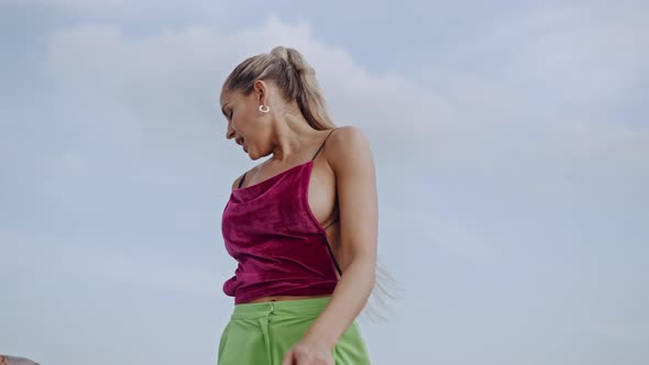 Fashion Models Dancing In Clubwear On City Roof