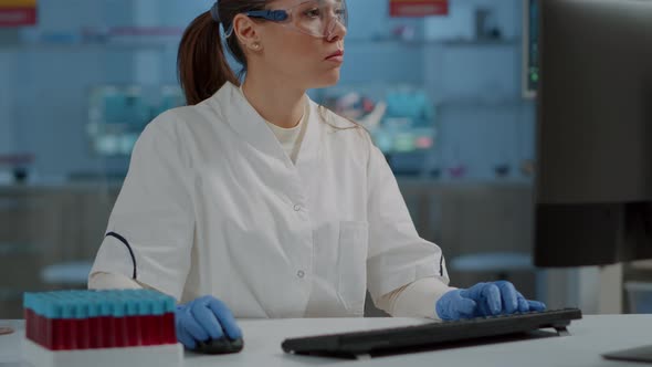 Portrait of Chemist with Safety Goggles Smiling at Camera