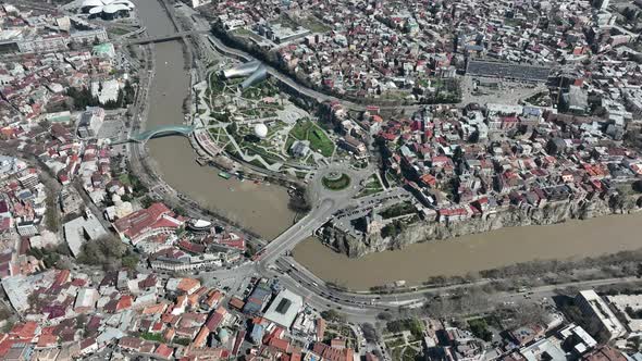 Aerial view of Old Tbilisi in the center of city. Morning cityscape of capital of Georgia 2022