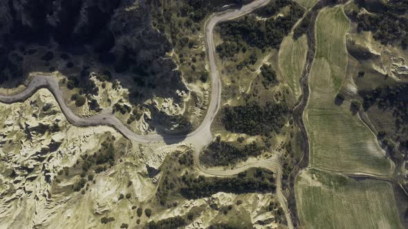 Rocks And Curly Road Top View