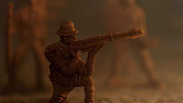 A Toy Plastic Soldier Falls with a Gun in a Flashing Red Light