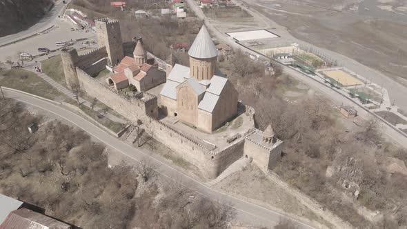 Aerial view of old Ananuri Fortress with two churches and picturesque view on river. Georgia 2021
