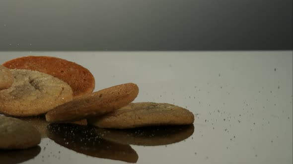 Cookies falling and bouncing in ultra slow motion 1500fps - reflective surface - COOKIES PHANTOM 043