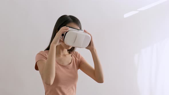 Woman looking at movie on virtual reality device