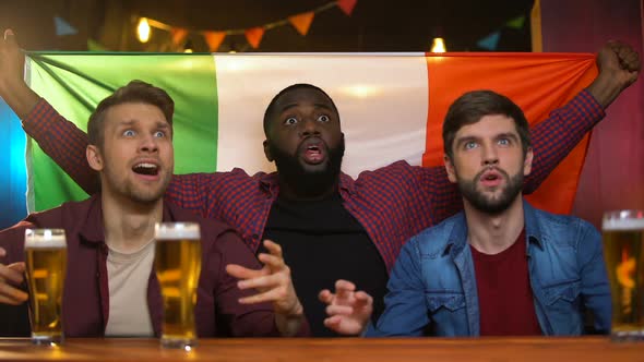 Italian Soccer Team Losing Game, Multiracial Male Friends Disappointed, Pub
