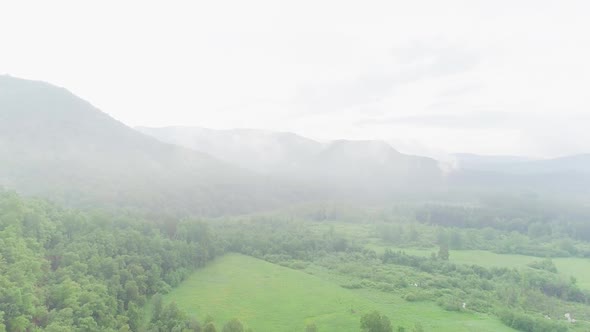 Aerial Video of Clouds Mountains Forest and Mountain River