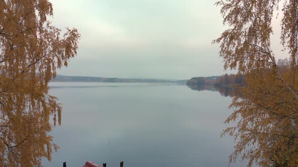 Revealing a resting area next to a calm lake.