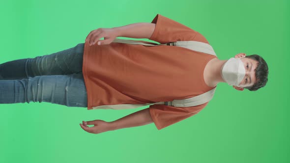 The Front View Of Asian Boy Student Walking  To School On Green Screen Chroma Key