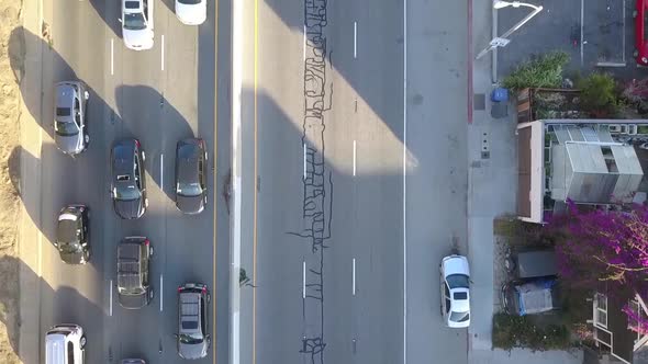 Cars long shadow, highway bridge.Breathtaking aerial view flight bird's eye view drone footageat L