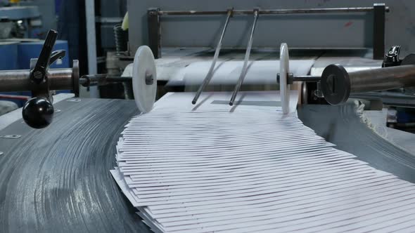 Industrial process of making envelopes in a factory