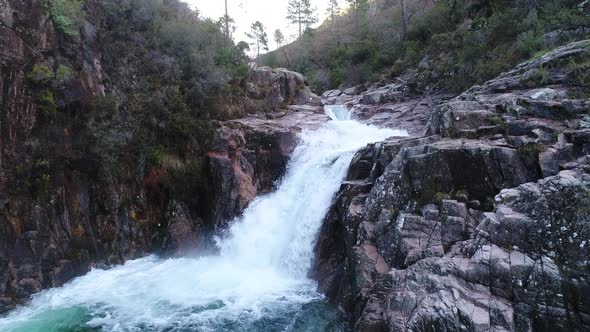 Crystal clear waters of Portela do Homem waterfall, Geres National Park, Portugal