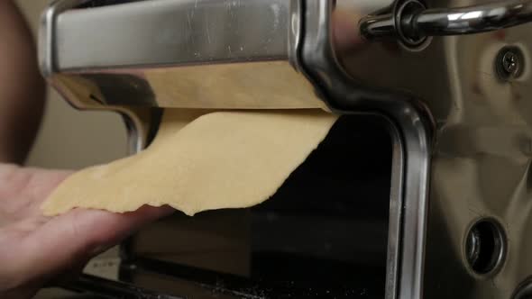 Slow motion manual pasta machine in the kitchen   1920X1080 HD footage - Making   Italian lasagna fr