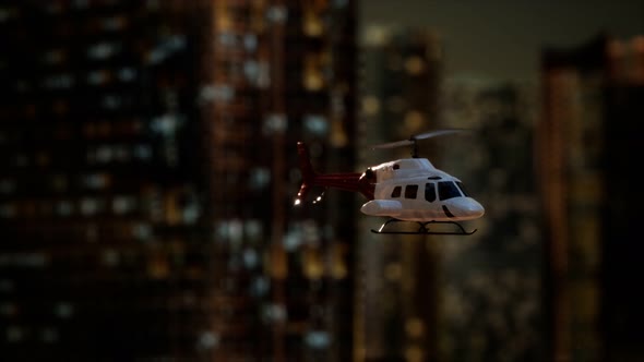 Slow Motion Helicopter Near Skyscrapers at Night