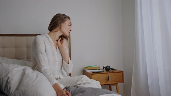 Depressed Woman Suffers From Headache After Waking Up