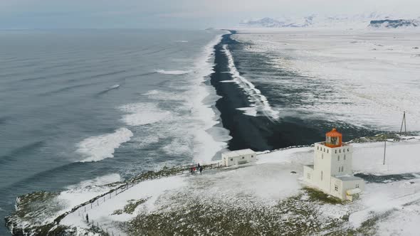 Aerial View of Iconic Black Sand Beach Around Reynisfjara Beach and Dyrholaey Lighthouse