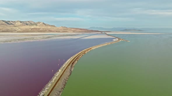 Aerial - Amazing Circle Pan Shot of Two Colors Lake at the Great Salt Lake in Utah