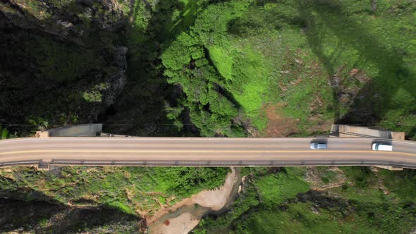  of Vehicles Driving By the Picturesque Big Sur Bridge Over the Canyon