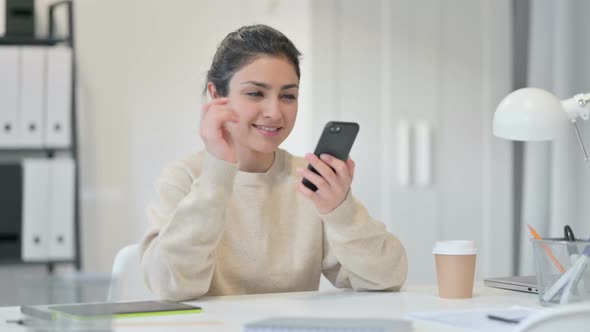 Indian Woman Using Smartphone Browsing Internet