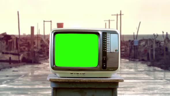 Old TV Set With Green Screen in the Ruins of an Old Ghost City. 4K Version.