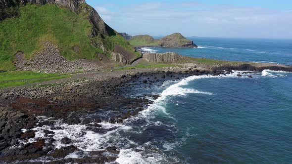 The Giants Causeway lies at the foot of the basalt cliffs along the sea coast on the north shores of