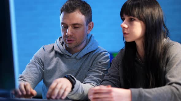 Portrait of Worried Caucasian Man Having Problems Coding App As Woman Calming Down Boyfriend