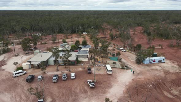 High aerial view of an old opal mining pub in the Australian outback of a small mining town in the o