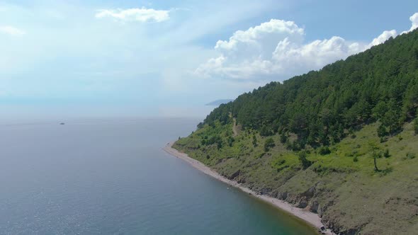 Flight Over the Rocky Shore of Lake