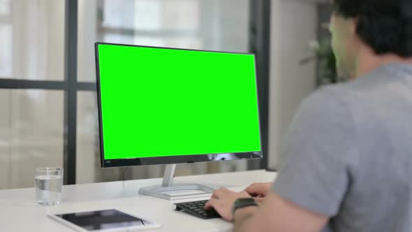 Businessman Using Desktop with Green Chroma Key Screen