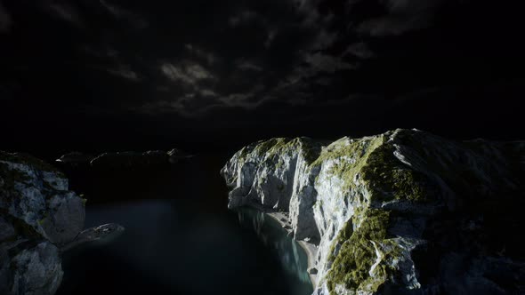 Fjord with Dark Storm Clouds