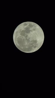 Vertical Video of the Full Moon in the Night Sky