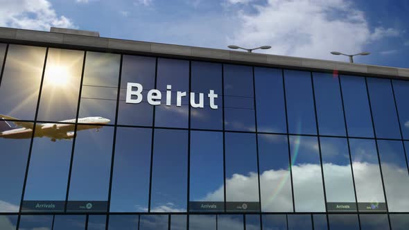 Airplane landing at Beirut Lebanon airport mirrored in terminal