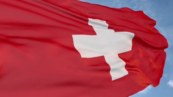 The red flag and the cross of Switzerland.