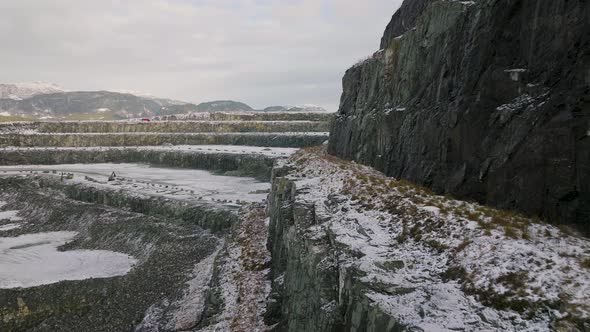 Deep Excavation Site Stepped Structure In Jelsa Quarry Pit, Norway