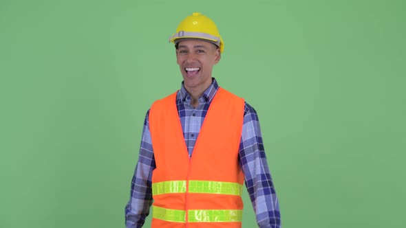 Happy Multi Ethnic Man Construction Worker with Ok Sign