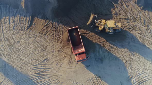 Aerial Top View of the Machines at Work at the Construction Site