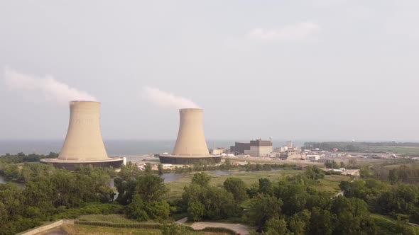 Smoke Billowing Out The The Building Of Enrico Fermi II Nuclear Power Plant In Newport, Michigan. ae