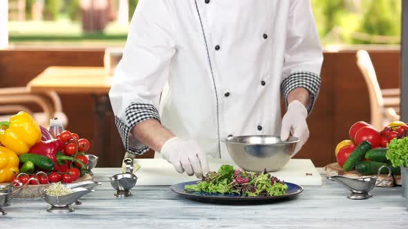 Chef Making Lettuce Salad