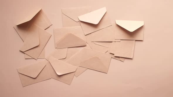 Thank you Message and Envelope on Wooden Table