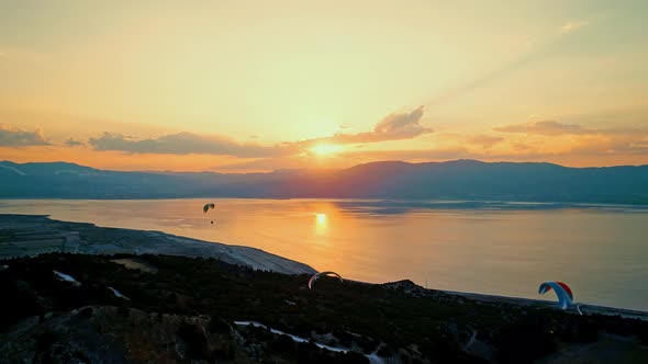 Paragliders With Sunrise