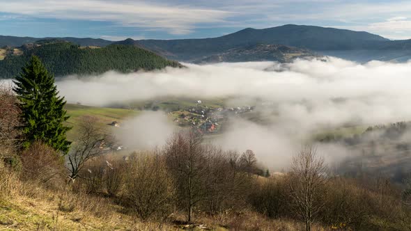 Foggy Morning in Small Village in Autumn Rural Landscape