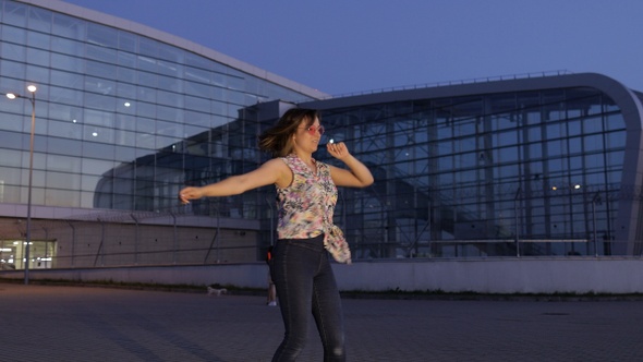 Happy Woman Tourist Dancing, Having Fun, Enjoying Dance, Celebrating Success, Party Music. Evening