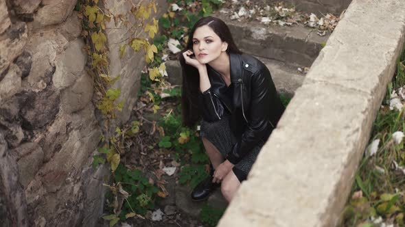 Portrait of a Woman on a Vintage Staircase