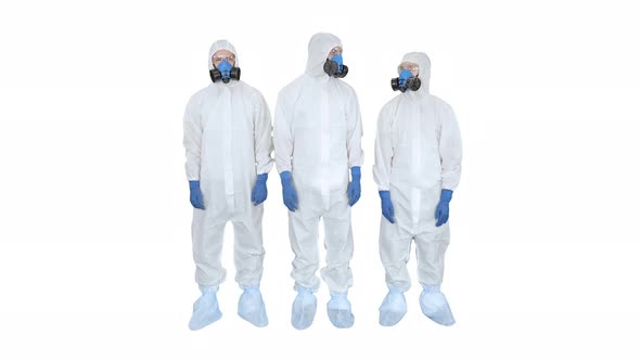 Three Doctors in Protective Clothes Fold Hands Team Work on White Background