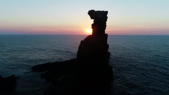 Aerial View of a Rock Formation at Sunset