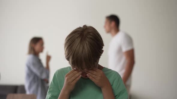 Kid Son Feels Upset While Parents Fighting at Background Sad Little Girl Frustrated with